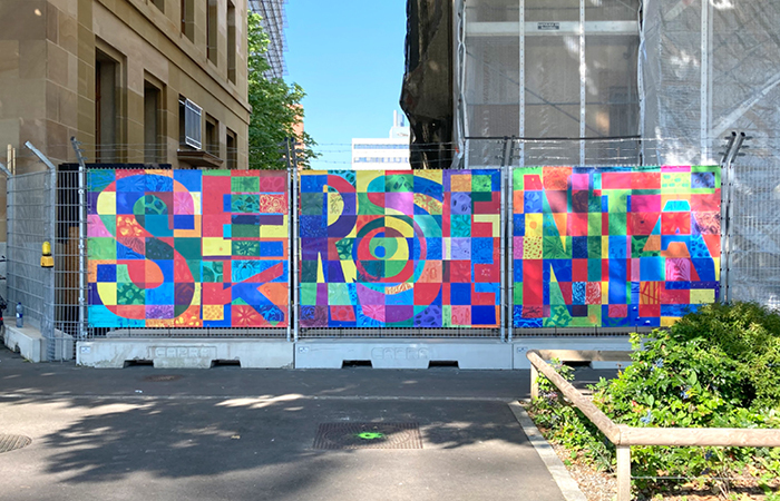 Art on the site fence as a collaborative work.